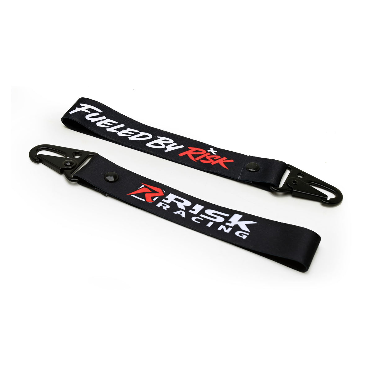 Black Risk Racing keychain lanyard shown from both sides with a black clip, Risk Racing logo, and Fueled by Risk graphic.
