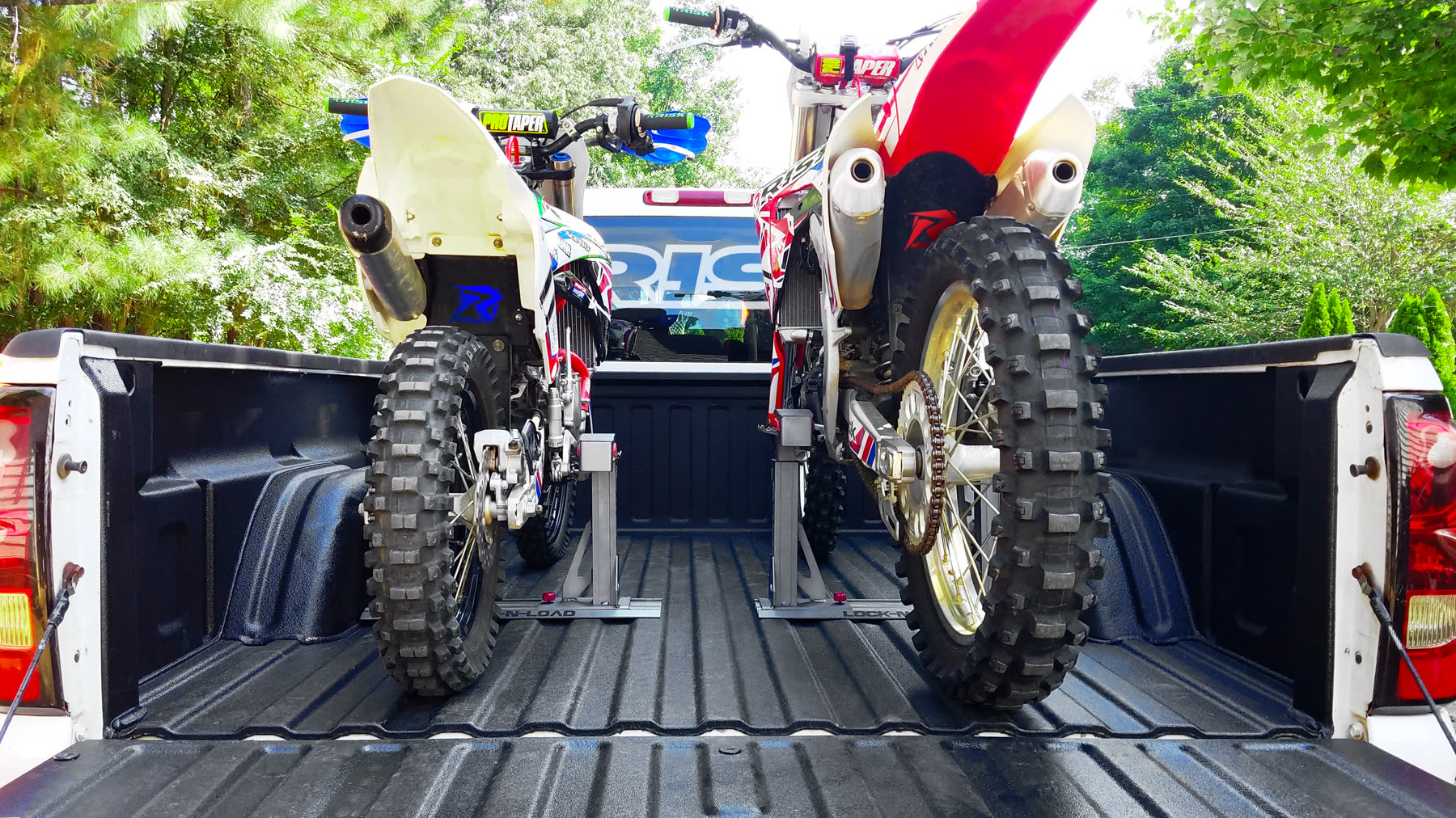 Dirt bike secured in a truck bed with Lock-N-Load Pro